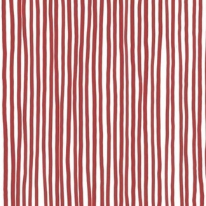 Hand-drawn organic irregular fine-lines in monochromatic tones of red and white, vertical stripes for kids apparel, home decor, bag making, lounge-wear, minimalist pillows and soft furnishings