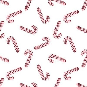 Red And White Candy Canes On White