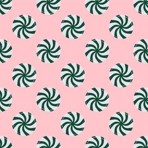 Green And White Peppermint Candy On Pink