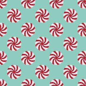 Red And White Peppermint Candy On Turquoise