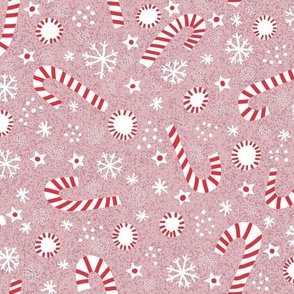 Christmas candy canes on pink normal scale
