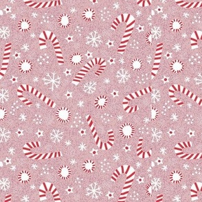 Christmas candy canes on pink small scale