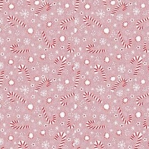 Christmas candy canes on pink tiny scale
