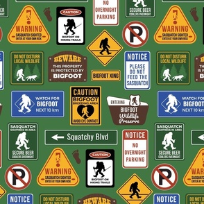 Bigfoot Crossing Warning Signs on Green