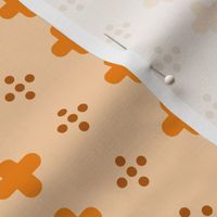 swiss crosses and dots on light orange | small