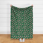 Large Scale Christmas Tree Frosted Snack Cakes on Emerald Green