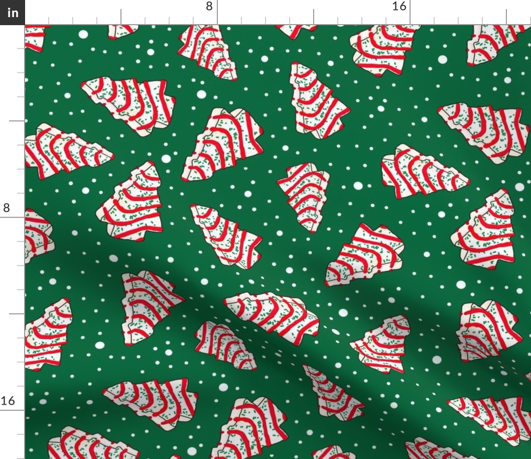 Large Scale Christmas Tree Frosted Snack Cakes on Emerald Green