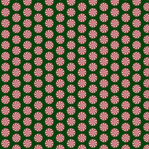 Red and White Peppermint Christmas Candy Swirls on Forest Green