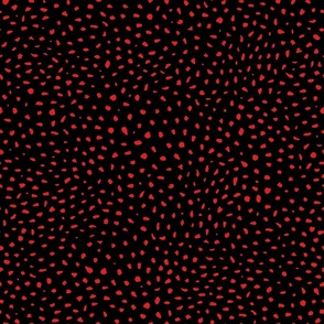 Medium scale black and red polka dots print