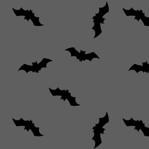 Black bats  on charocal grey background. Halloween charocal fabric with bats. Halloween wallpaper