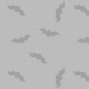 Grey bats on grey background. Halloween grey fabric with bats. Halloween wallpaper