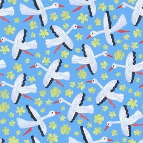  White storks on a blue background