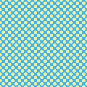 Large yellow polka dots on blue background