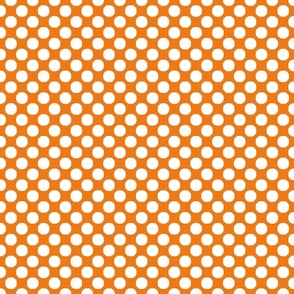 Large white polka dots on orange background.