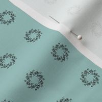 Christmas -Black Wreath on Light Teal - a1cbc6