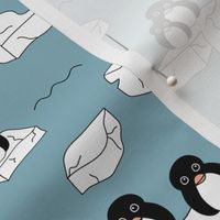 Winter penguins on melting pieces of ice winter ocean ice cap animals Christmas design blue