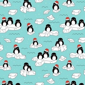 Santa christmas penguins on melting pieces of ice winter ocean ice cap animals design teal blue