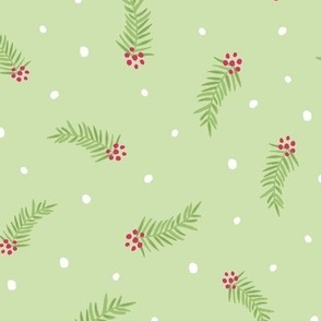 Christmas Evergreen Sprig with Berries and Falling Snow on a Green Background