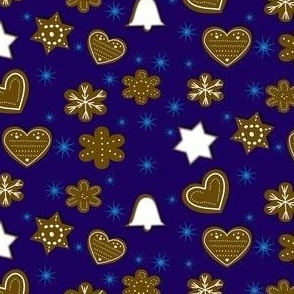 Iced Gingerbread Cookies with Stars on a Blue Background