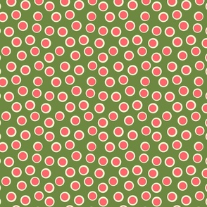 polka dots cream and pink on green