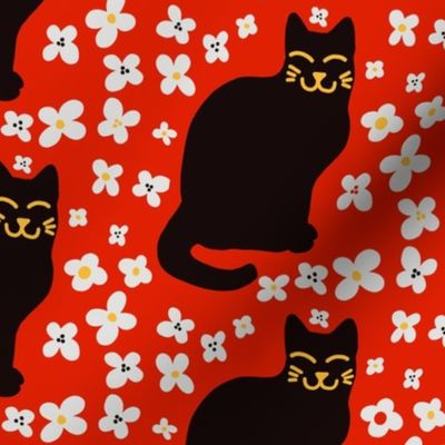 Smiling Black Cat on red with flowers  