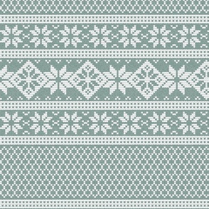 White knitting stitches on light blue texture, large