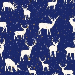 Reindeer and gold Snowflakes on blue background	