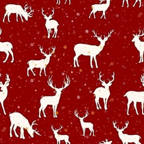 Reindeer and gold Snowflakes on rad background	