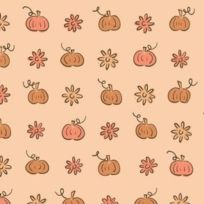 Harvest line up :: orange pumpkins and flowers lined up geometrically on a peach background
