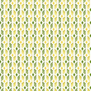 Abstract yellow and green pattern of dashes and leaves