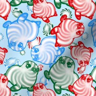 Assorted mint swirl candy seals on ice blue