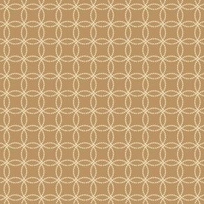 Geometric Dotted Floral Tile Pattern in Light Yellow Gold on a Solid Dark Gold Background with 2 inch Repeat