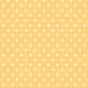 Polka dot fabric in spring palette in light cream and yellow