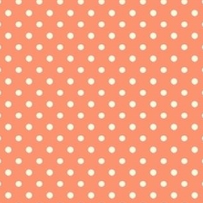 Polka dot fabric in spring palette in orange mandarine and cream