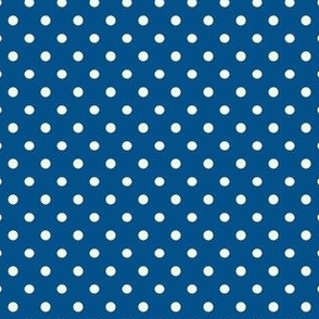 Polka dot fabric in spring palette in marine blue and cream