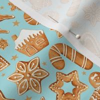 Medium Scale Frosted Holiday Cookies Gingerbread Reindeer Santa Christmas Trees on Soft Aqua Blue