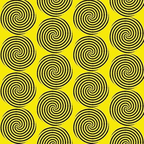 Black spirals, yellow background