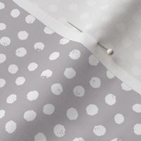 Snowflakes, snowballs or simple dots - on grey