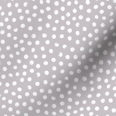 Snowflakes, snowballs or simple dots - on grey