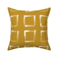 Beautifully imperfect hand-drawn geometric square pattern on rich brownish yellow.