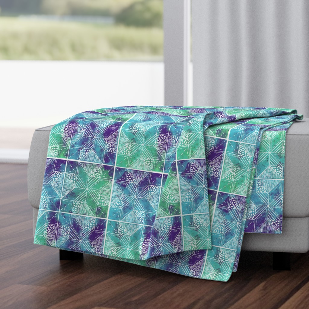 hand-printed teal, blue and purple quilt pattern