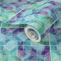 hand-printed teal, blue and purple quilt pattern