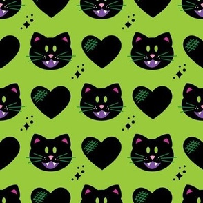 black cat w hearts on green