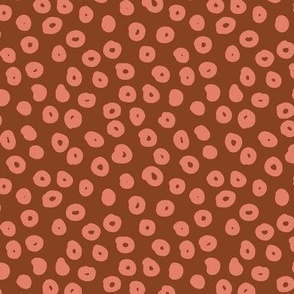 Polka dots hand drawn orange tone dots