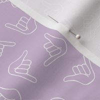 Aloho shaka surf - salty sea ocean greetings hang loose sign hand gesture white on lilac purple summer spring