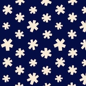 Cream winter stars on a navi blue background