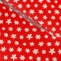 Cream winter stars on a red background