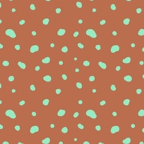 Smooth little dotty - duotone spots and dots freehand messy confetti design neon mint on burnt orange sienna