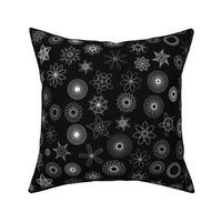 gear-drawn spiral designs - white on black  (life sized, 16" repeat)