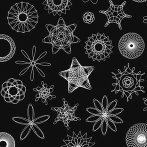 gear-drawn spiral designs - white on black